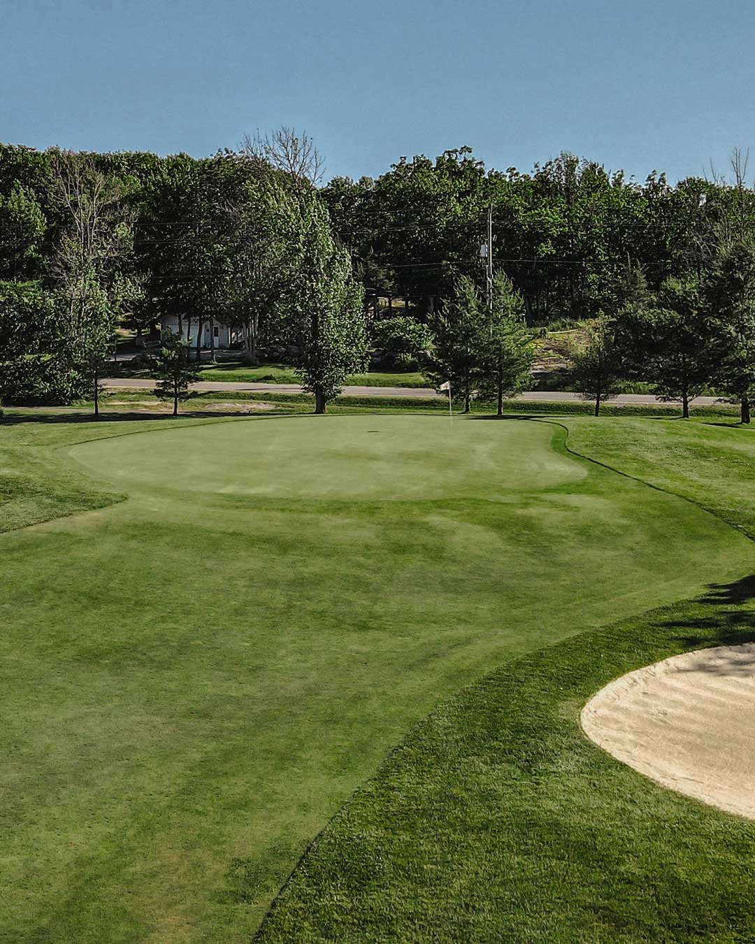 Muskoka golf green with bunker