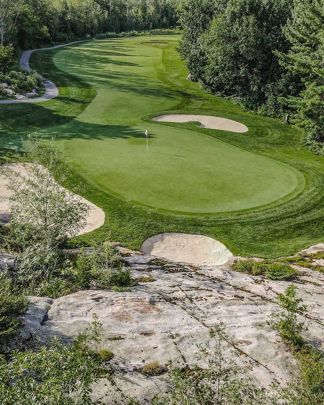 Muskoka golf green large rock outcropping
